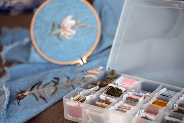 Assorted embroidery kits on table